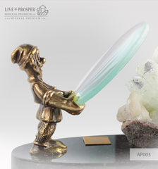 Bronze Dwarf figure with a Magnifying glass and Apophyllite