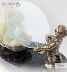 Bronze Dwarf figure with a Magnifying glass and Apophyllite
