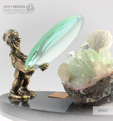 Bronze dwarf figure with a magnifying glass and apophyllite on a dolerite plate Бронзовый гном с увеличительным стеклом и апофиллитом на пластине из долерита 