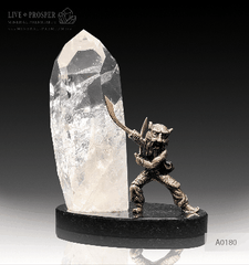 Bronze Samurai with the quartz obelisk on a dolerite plate and color led system