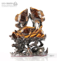 Solid tiger's eye carving of fish family playing under the sea on a wooden stand Стая рыб играющая на морском дне из тигрового глаза на деревянной подставке