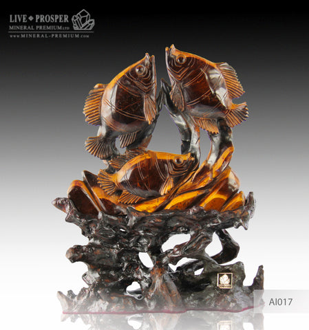 Tiger Eye carving of Fish family Playing under the Sea on a Wooden stand
