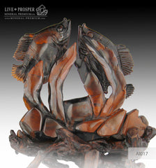 Solid tiger's eye carving of fish family playing under the sea on a wooden stand Стая рыб играющая на морском дне из тигрового глаза на деревянной подставке