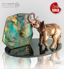 Bronze Elephant figure with Labradorite on a Dolerite plate