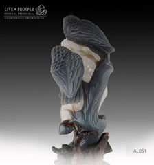 Agate carving of Two owls on branch with Amethyst Druze hollow on a Wooden stand