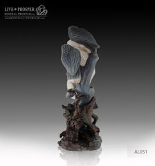 Agate carving of Two owls on branch with Amethyst Druze hollow on a Wooden stand