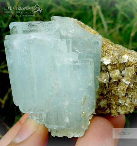 Sky Blue aquamarine 625 CT with Muscovite