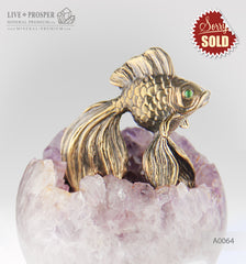 Bronze figure of Goldfish with Demontoids eyes on Amethyst sphere on a Dolerite plate