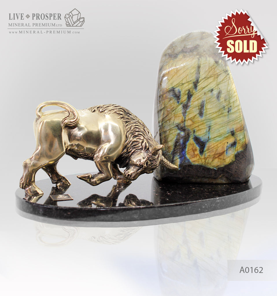 Bronze Bull figure with labradorite on dolerite plate
