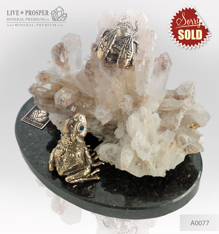 Bronze frog and Fly figures with Demantoid inserts with Quartz on a Dolerite plate