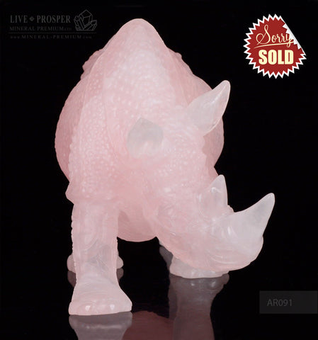 Solid Rose Quartz carvings of Rhinoceros on guard 2
