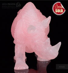 Solid Rose Quartz carvings of Rhinoceros on guard
