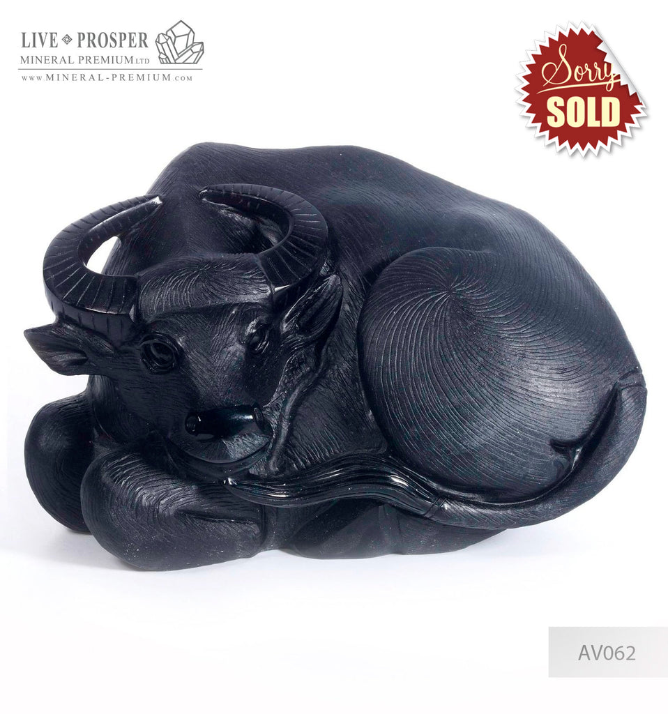 Solid black obsidian Bull carving