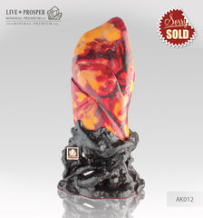 Solid "Dragon Eye " Polishing stone Jasper mookaite - yaspis on a Wooden stand